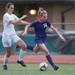Pioneer's Katherine Matton and Skyline's Emma Hutton fight for the ball during the first half of the district finals, Friday May 31.
Courtney Sacco I AnnArbor.com